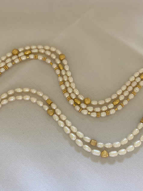  a seme con perle di acqua dolce von chiusura in argento placcato oro