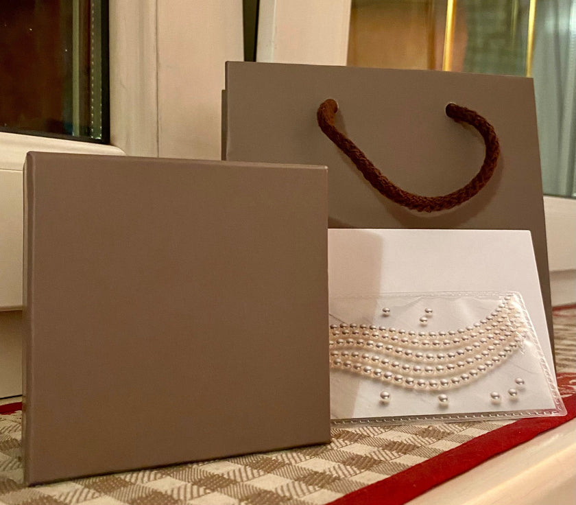 Orecchini artigianali con perla di Tahiti e granato - Firenze